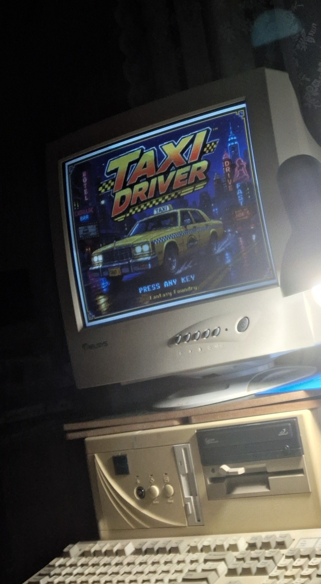 Taxi Driver splash screen displayed on a CRT monitor